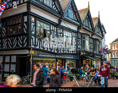 Bustling crowds outside the tudor shops in Nantwich High Street, Cheshire, UK Stock Photo