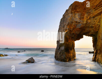 France, Brittany, Morbihan, Cote Sauvage, Quiberon Peninsula, The Arch at Port Blanc at dusk Stock Photo