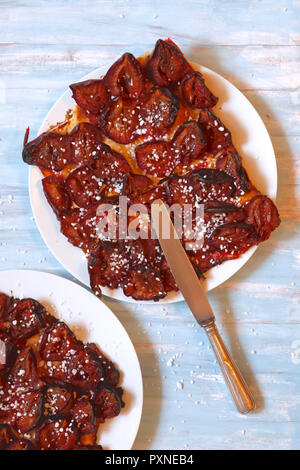 Plum cake, piece of cake on plate Stock Photo