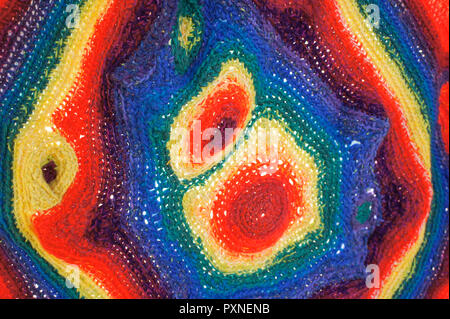Colourful crocheted wool cloth as a background Stock Photo