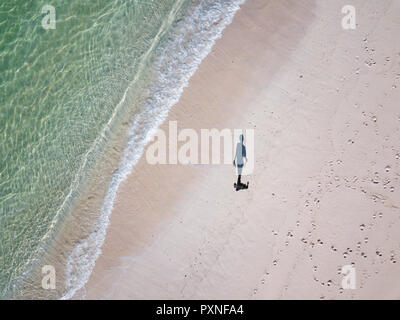 Indonesia, Bali, Aerial view, beach stroll, shadow of person Stock Photo