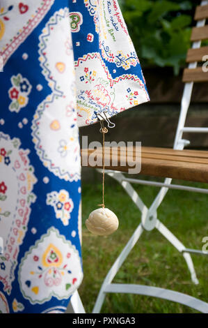 DIY, Tablecloth from Portugal and shell, tablecloth weight Stock Photo