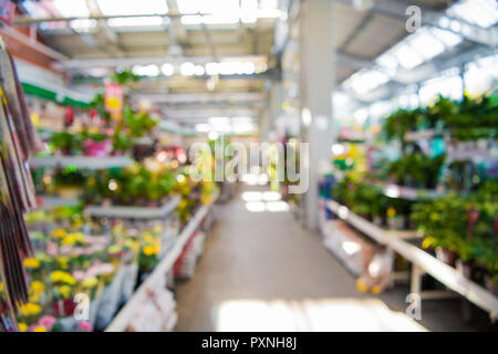 Abstract blur people in home and gardening market fair event background Stock Photo