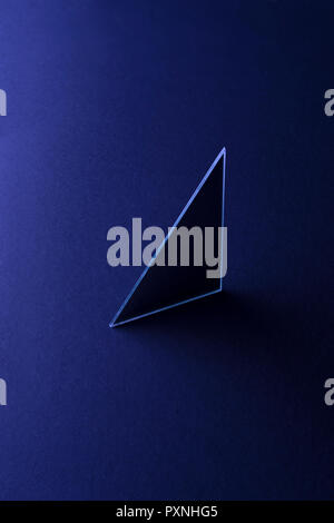 Triangle shaped mirror on dark blue ground, 3D Rendering Stock Photo ...