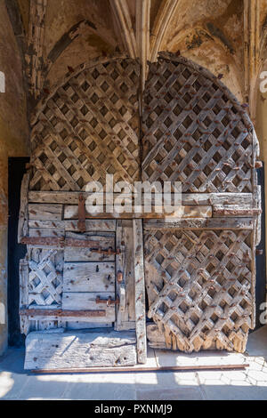 Twelfth century wooden door at Chepstow  Castle, Monmouthshire, Wales, United Kingdom, Europe Stock Photo