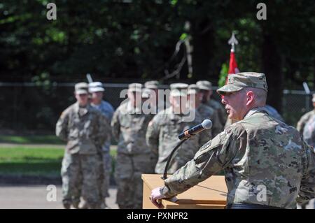 U.S. Army Reserve Brig. Gen. Daniel Christian, acting commander, 412th Theater Engineer Command, officiated a change of responsibility and retirement ceremony at the George A. Morris Army Reserve Center in Vicksburg, Miss., June 10, 2017. Command Sgt. Maj. Dennis Law assumed the duties as the Command's senior enlisted adviser. Command Sgt. Maj. Richard Castelveter retired after more than 35 years of honorable service. Stock Photo