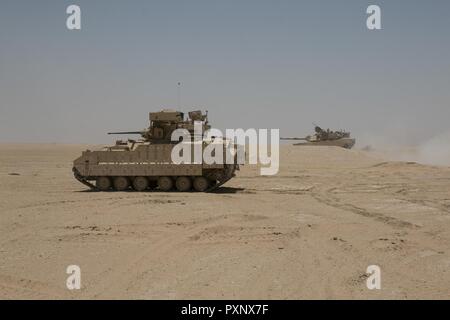 An M2A3 Bradley armored reconnaissance crew assigned to 6th Squadron ...