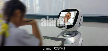 smart education industry futuristic concept, robotic assistant with artificial intelligence program in future use for teaching student with math, sing Stock Photo