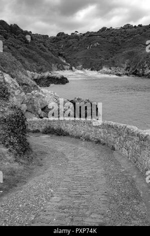 Black and white of saints bay at guernsey, Channel Island Stock Photo