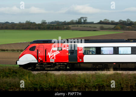 Virgin Trains Voyager diesel, side view at speed, Warwickshire, UK Stock Photo