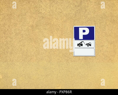 Parking sign with a warning of towing away if parked there, to park or not to park Stock Photo