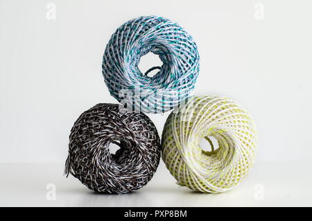 Colorful wool balls against bright white background, isolated Stock Photo