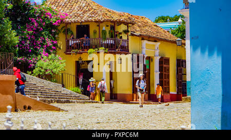 TRINIDAD, CUBA - MAY 25, 2014: Unidentified people on the street of Trinidad, Cuba. Trinidad has been a UNESCO World Heritage site since 1988. Stock Photo