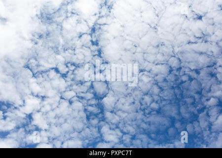 Beautiful blue sky with puffy white clouds - altocumulus Stock Photo