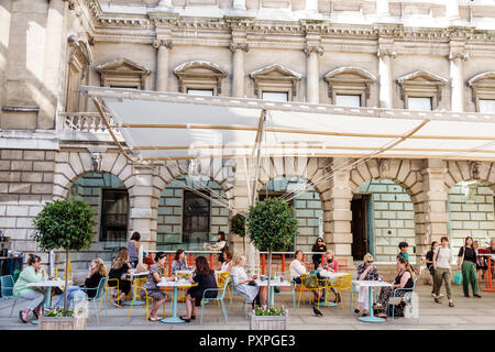 London England,UK,Mayfair Piccadilly,Royal Academy of Arts,Burlington House,courtyard,patio cafe,al fresco,sidewalk outside tables dining street,table Stock Photo