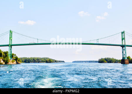 Constructed in 1937, the Thousand Islands International Bridge spans over the St. Lawrence River connecting New York, USA, with Ontario, Canada in the