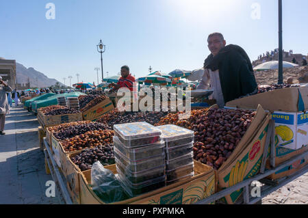 MEDINA,SAUDI ARABIA-CIRCA 2014: Dried and moist dates being sold at Hud (jabal hud) mountain area in Al Madinah, Kingdom of Saudi Arabia. Stock Photo