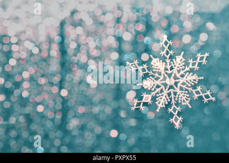 christmas background with highlights and silvery snowflakes Stock Photo