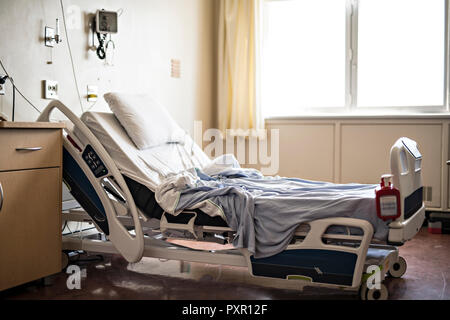 Hospital room with beds and comfortable medical equipped Stock Photo