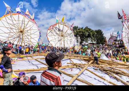 Santiago Sacatepequez, Guatemala - November 1, 2017: Giant kite festival honoring spirits of dead in cemetery on All Saints Day. Stock Photo