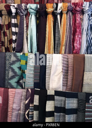 Silk scarves on display at Ock Pop Tok silk weaving center in Luang Prabang, Laos Stock Photo
