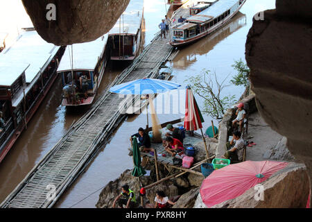 View from Tham Ting (lower Pak Ou caves) down onto the Mekong River and boats near Luang Prabang, Laos Stock Photo