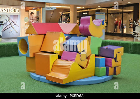 VILNIUS, LITHUANIA - OCTOBER 14, 2018: KIds   playground from Soft Play Shapes modules inside the largest city shopping center Panorama Stock Photo