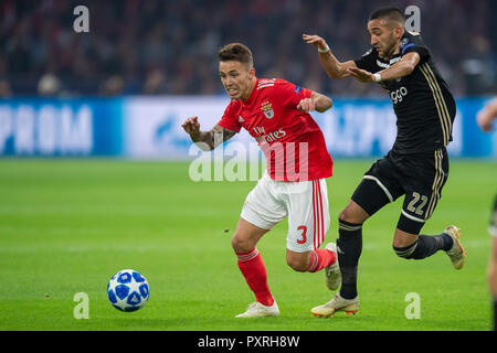 Amsterdam, Netherlands. 23rd October, 2018. Ajax v Benfica: Amsterdam Champions League 2018-2019 Alex Grimaldo of Benfica, Hakim Ziyech of Ajax Credit: Orange Pictures/Alamy Live News Credit: Orange Pictures/Alamy Live News Stock Photo