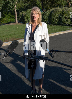 Washington, United States Of America. 24th Oct, 2018. White House Senior Counselor Kellyanne Conway meets reporters on the driveway of the White House in Washington, DC on Wednesday, October 24, 2018. Credit: Ron Sachs/CNP | usage worldwide Credit: dpa/Alamy Live News Stock Photo