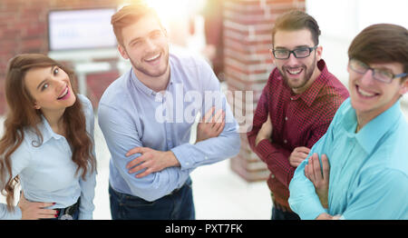 Smiling american team discussing business project during coffee  Stock Photo