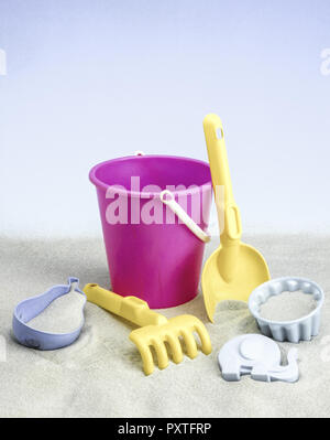 Sandspielzeug, Eimer, Schaufel, Formen, Sandbox toys, buckets, shovel, forms, Bucket, Holiday, Holidays, Childhood, Sand, Sandy, Beach Toys, Sandbox,  Stock Photo