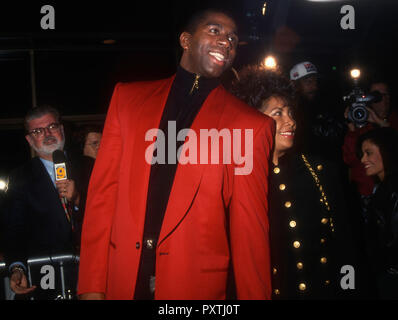 BEVERLY HILLS, CA - NOVEMBER 17: Magic Johnson and wife Cookie Johnson attend Warner Bros. Pictures' 'Malcolm X' Premiere on November 17, 1992 at the Samuel Goldwyn Theatre in Beverly Hills, California. Photo by Barry King/Alamy Stock Photo Stock Photo