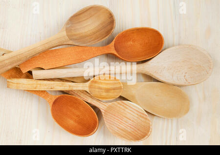 Home Kitchen Decor: wooden spoon on wooden background. Rustic style. View from above. Stock Photo