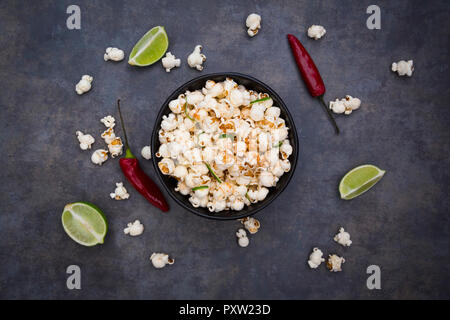 Bowl with popcorn flavoured with chili and lime Stock Photo