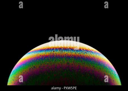 Shimmering surface of a soap bubble, close-up Stock Photo
