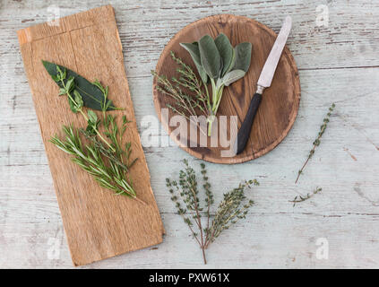 Fresh Provencal herbs, knife and   wooden boards Stock Photo