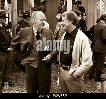 President elect Jimmy Carter talks with former Vice President Hubert Humphrey after a pre inaugural economic update for the soon to be president. The briefing was held at Carter's Pond House retreat near his hometown of Plains, Georgia. Stock Photo