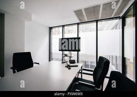 Empty conference room with flat screen Stock Photo