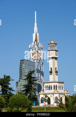 Georgia, Adjara, Batumi, Miracle Park, Chacha Clock Tower and technical university with big wheel in the tower Stock Photo