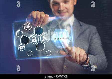 Business, Technology, Internet and network concept. Young businessman working on a virtual screen of the future and sees the inscription: Cyber crime Stock Photo