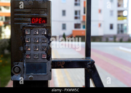 street intercom on the background of a residential building in blur, image with place for text Stock Photo