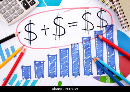 Simple savings or retirement formula written on a hand drawn bar chart surrounded by calculator, books and pencils. Stock Photo