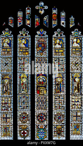 Geometric patterns of medieval coloured glass in the East Window of St. Martins Church, Stamford, UK Stock Photo