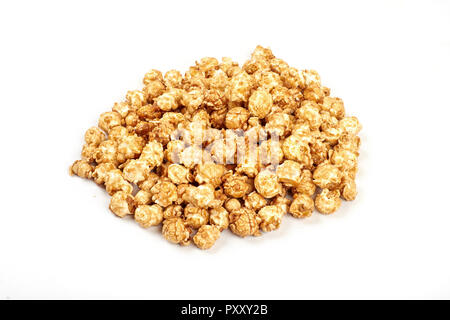 Pile of caramel popcorn on white background. Stock Photo