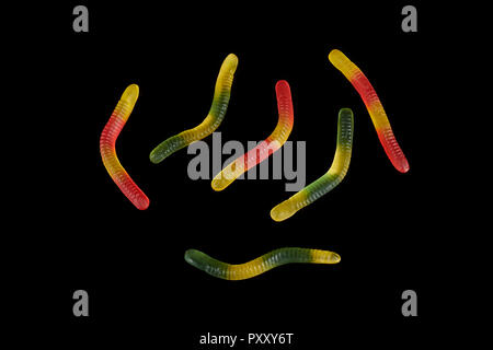 gummy jelly worm candy on a black background. Stock Photo