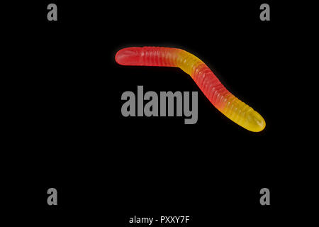 gummy jelly worm candy on a black background. Stock Photo