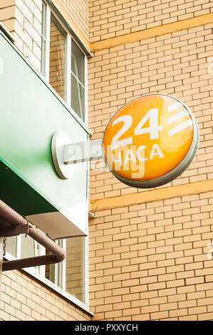 Veliky Novgorod, Russia - May 17, 2016. Sberbank - the largest bank in Russia. Sberbank Logo with the sigh 24 hours Stock Photo