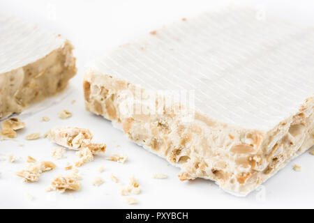 Typical christmas almond nougat isolated on white background Stock Photo