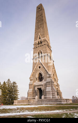 Obelisk monument on snowy winter day at Saratoga National Historical Park in New York. Stock Photo