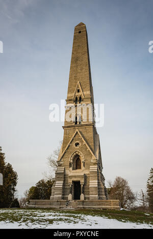 Obelisk monument on snowy winter day  Saratoga National Historical Park in New York. Stock Photo